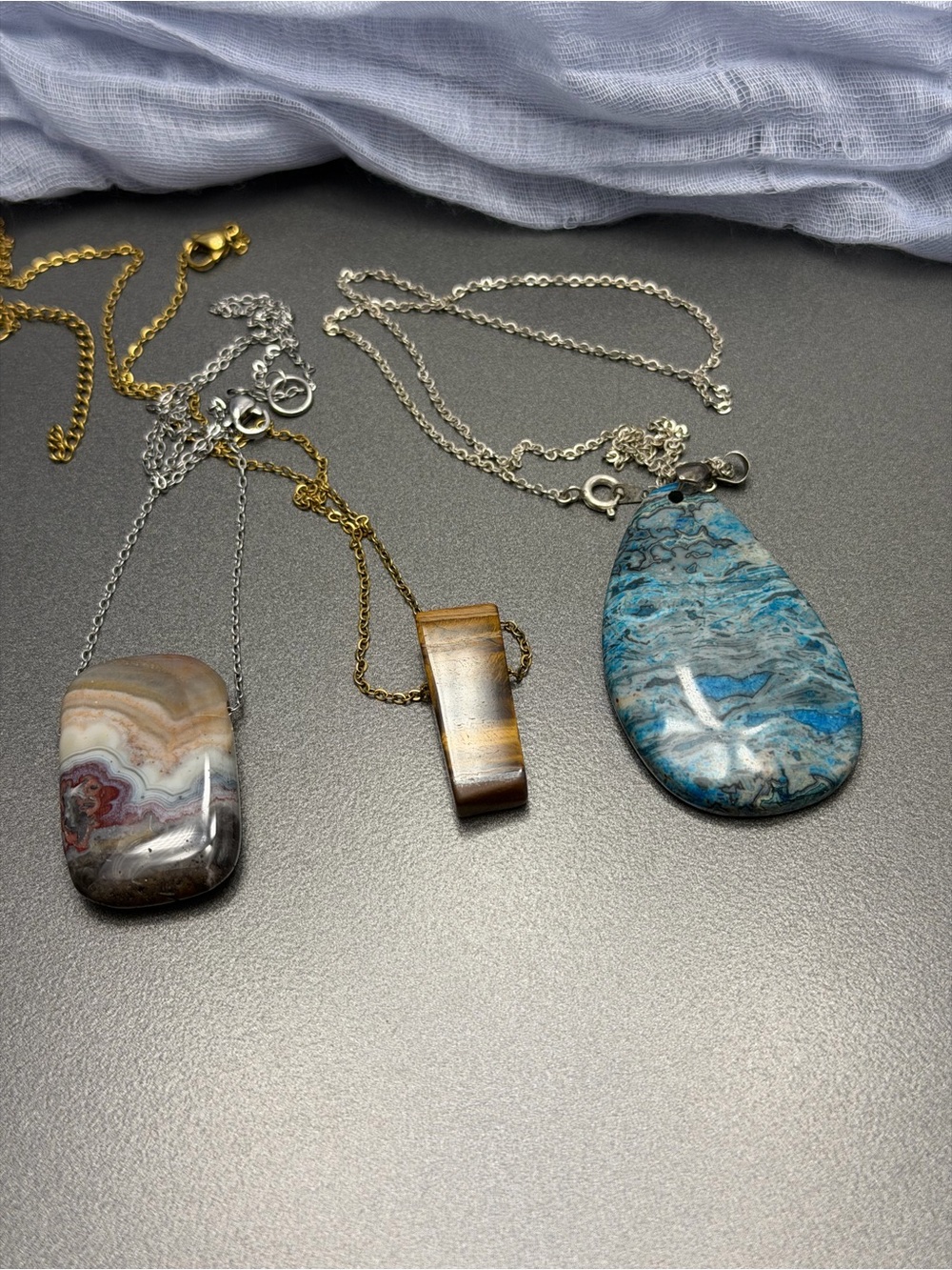 Three Semi Precious Stone Pendants